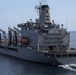 USS Arlington (LPD 24) refuels at sea