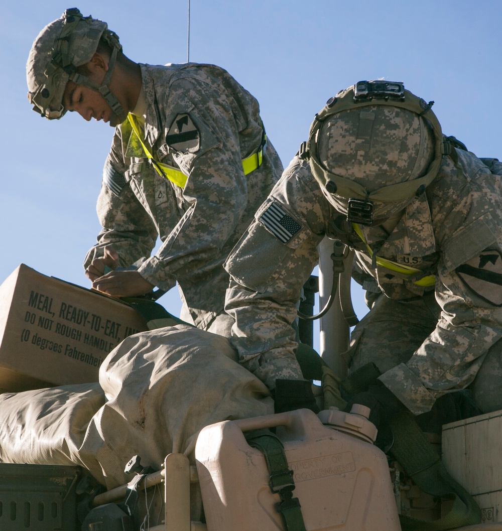 Soldiers pack up to fight the Donovians at Fort Irwin