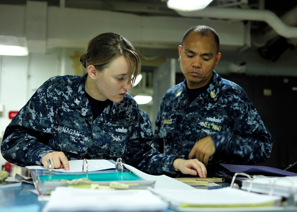 USS Blue Ridge sailors perform maintenance