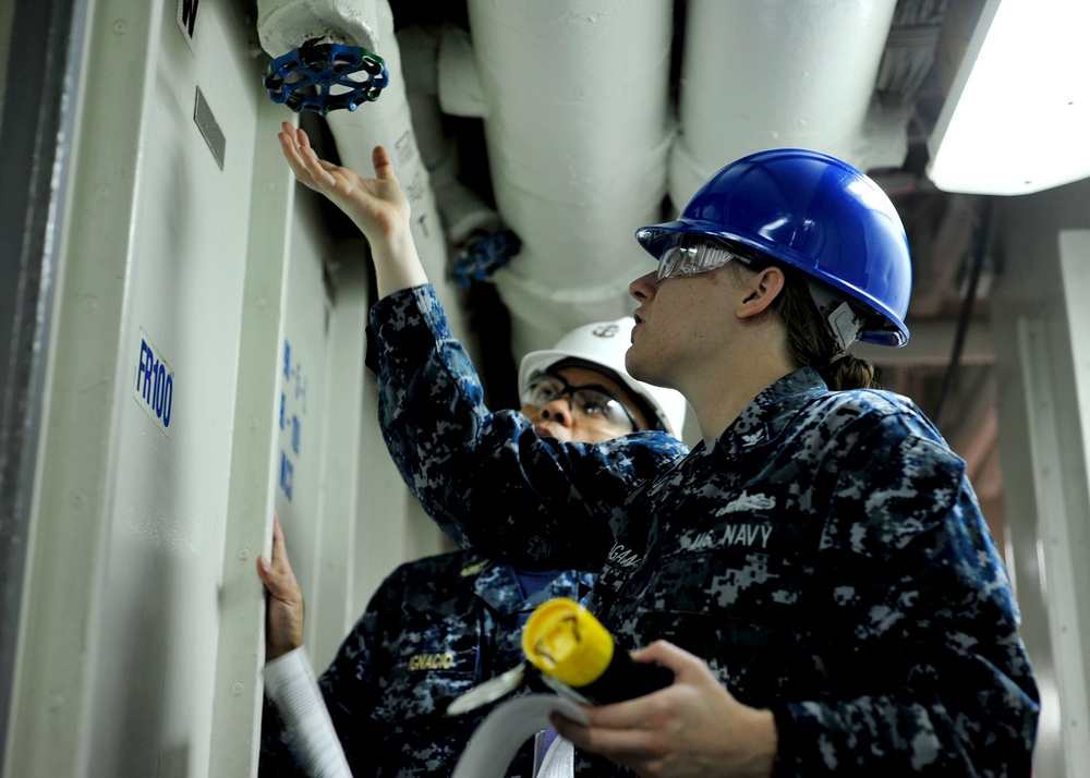 USS Blue Ridge sailors perform maintenance
