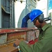 USS Blue Ridge sailors perform corrosion control