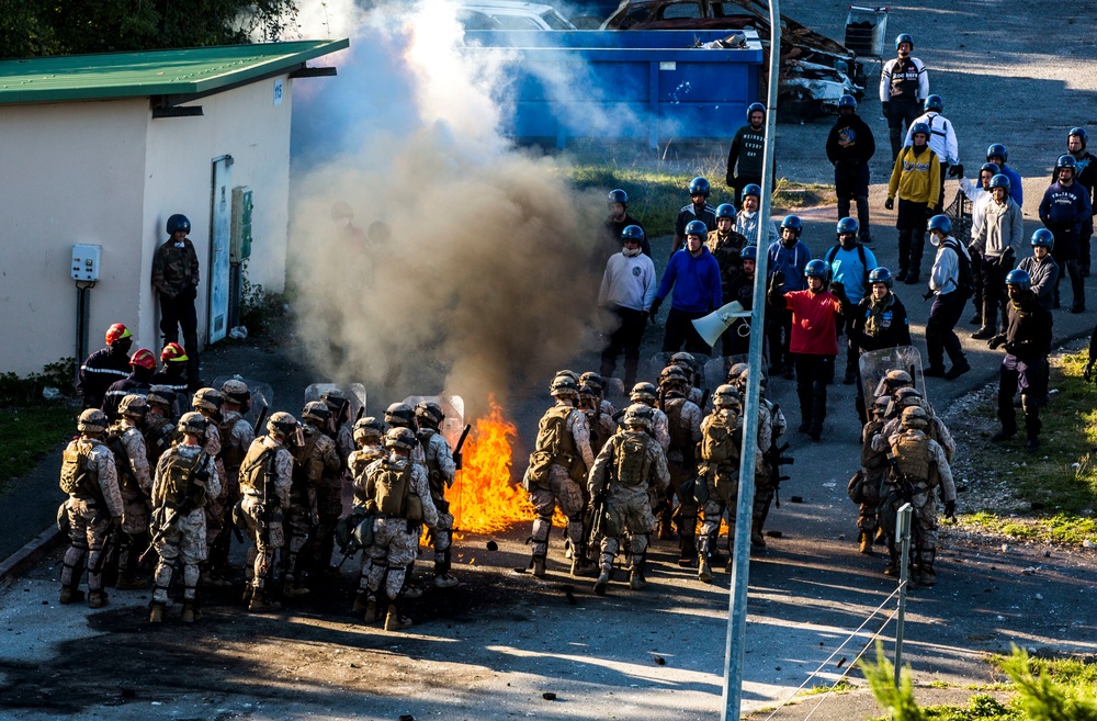 U.S., French crisis response forces quell riot