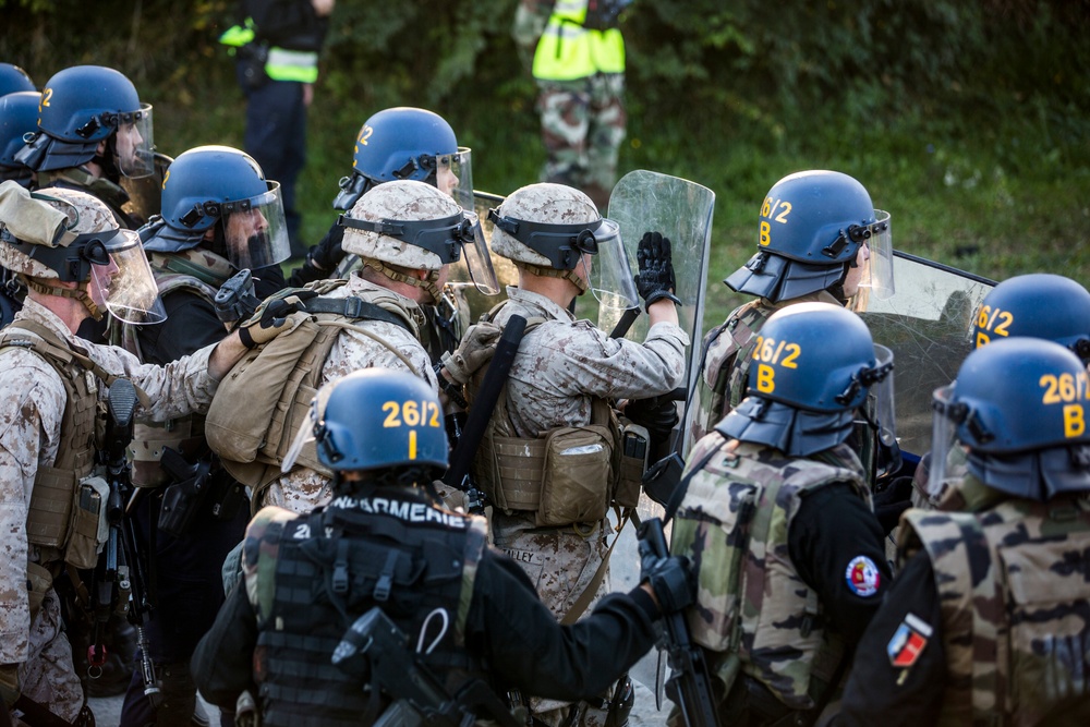 U.S., French crisis response forces quell riot