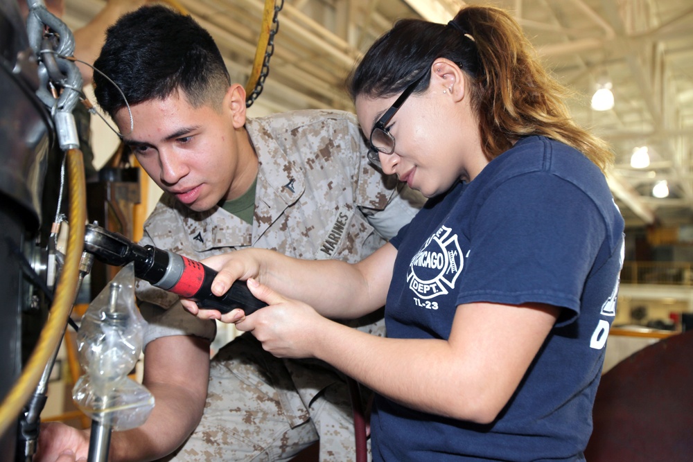 Families of MALS-14 Marines clock-in for fun