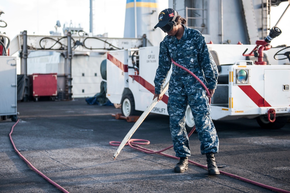 USS Harry S. Truman Sailor conducts FOD check