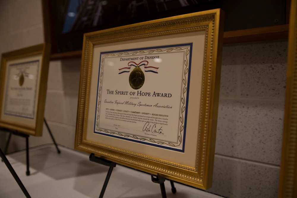 Quantico Injured Military Sportsman Association accepts the Spirit of Hope Award