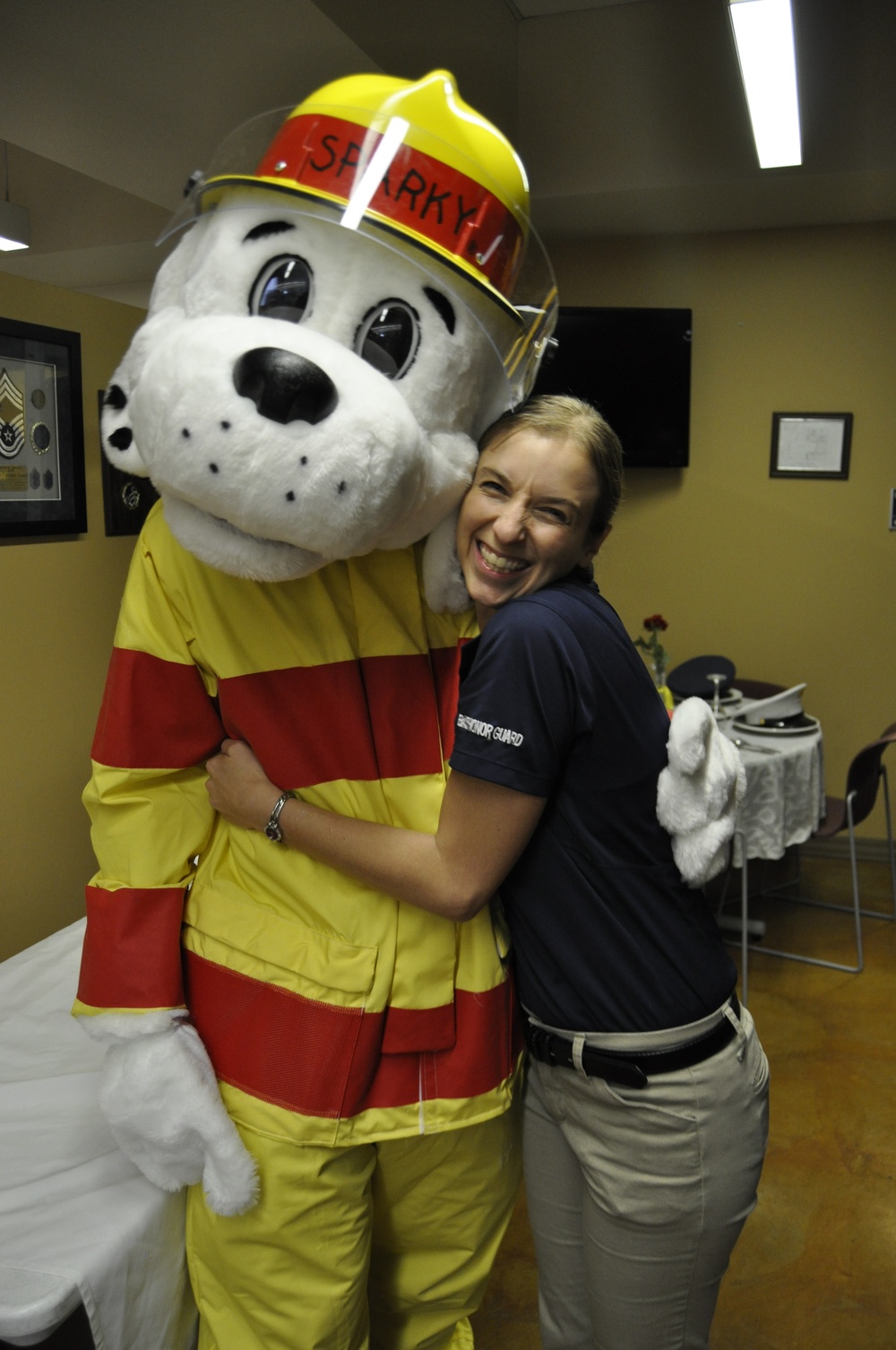 Sparky the Fire Dog visits the 152nd Airlift Wing to spread fire safety awareness