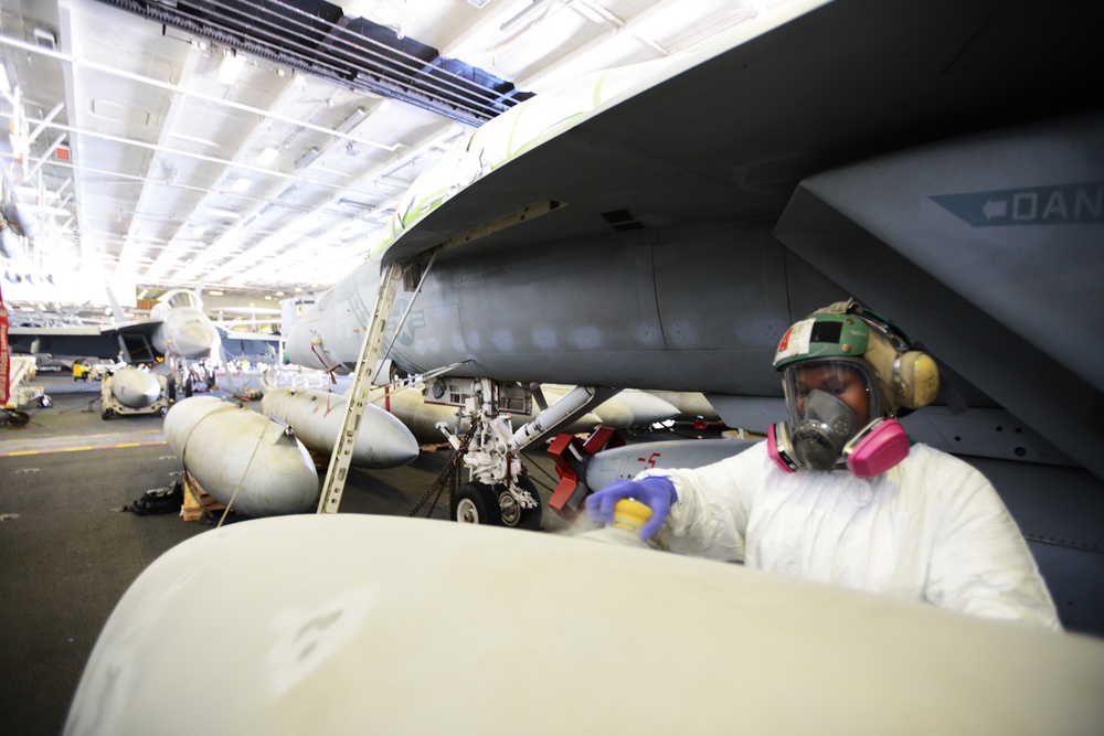 USS Ronald Reagan sailors perform maintenance