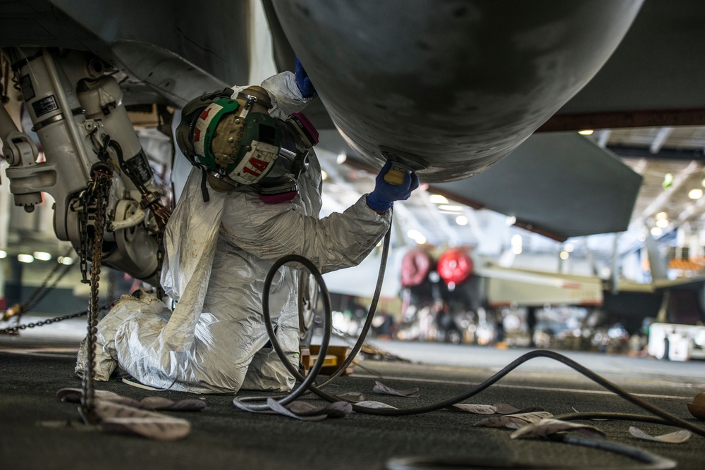 USS Ronald Reagan sailors perform maintenance