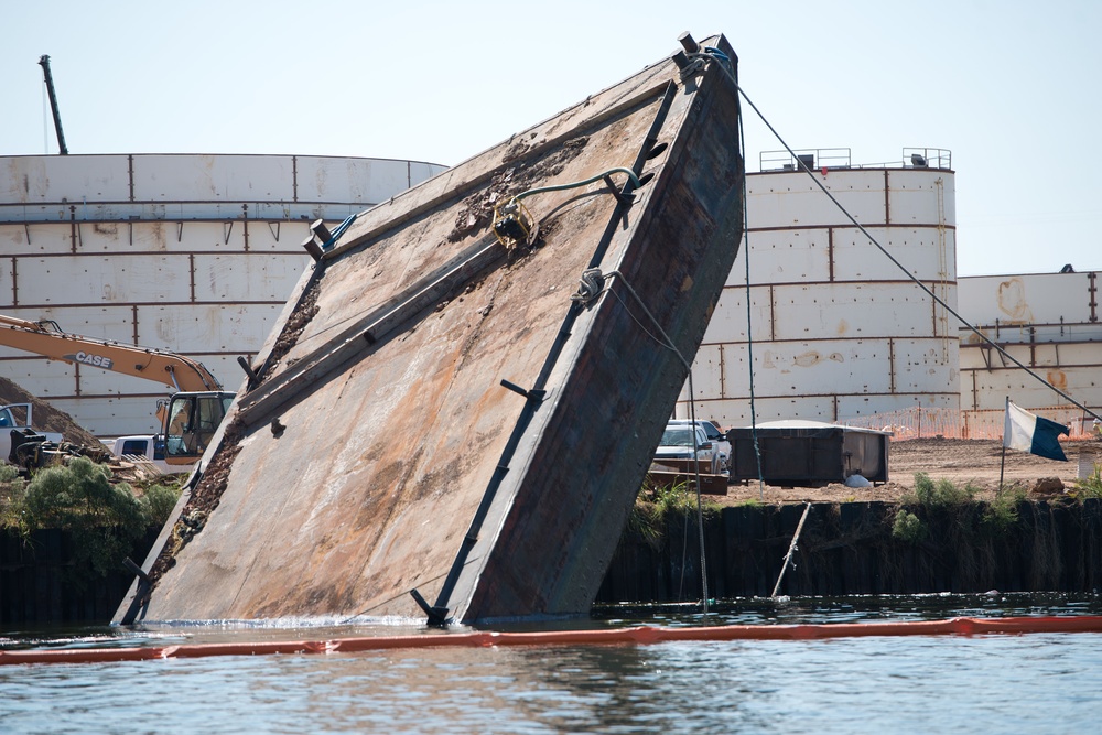 Sunken tugboat, barge submerged in upper Houston Ship Channel