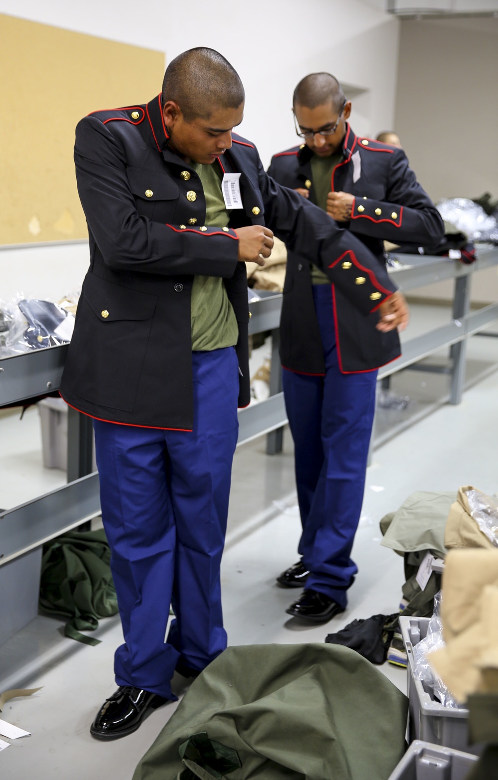 Recruits of Delta Company attend their first uniform fitting