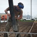 NMCB 1 Seabees place concrete at project in Naval Base Guam