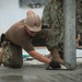 NMCB 1 Seabees place concrete at project in Naval Base Guam