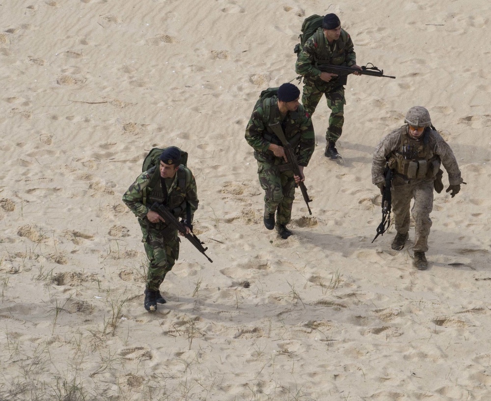 U.S. and Portuguese Marines train side-by-side during Trident Juncture 15