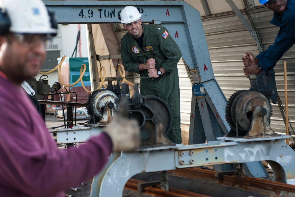 Catapult cylinder install on USS Lincoln flight deck