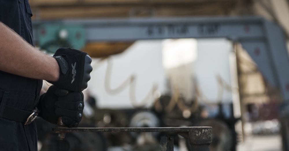 Catapult cylinder install on USS Lincoln flight deck