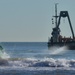 Coast Guard, Navy refloat buoy