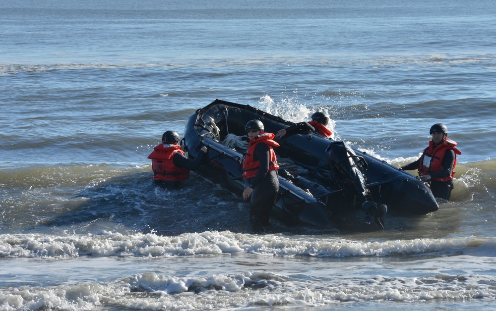 Coast Guard, Navy refloat buoy