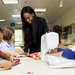 Cody CDC children create pillows for domestic violence awareness