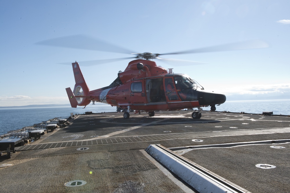 MH-65 Dolphin helicopter lands on USCGC Midgett