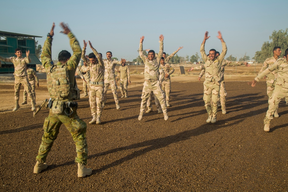 Iraqi soldiers receive chemical warfare, first-aid training at Camp Taji