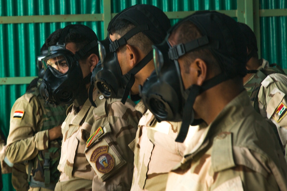 Iraqi soldiers receive chemical warfare, first-aid training at Camp Taji