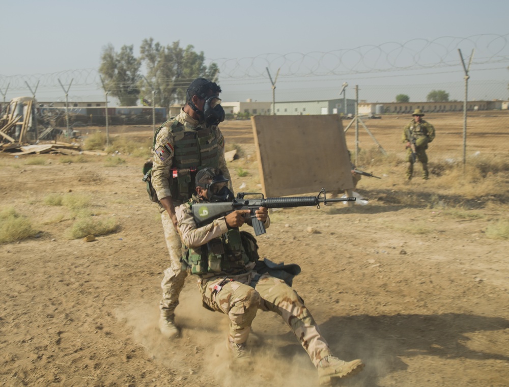 Iraqi soldiers receive chemical warfare, first-aid training at Camp Taji