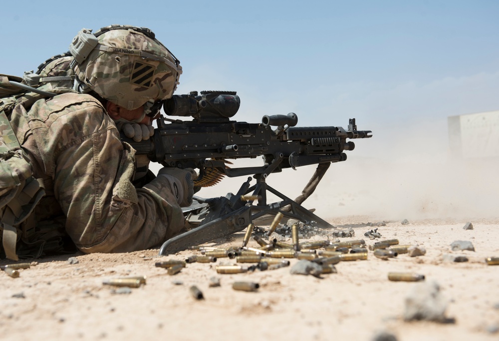 Soldier fires M240L 