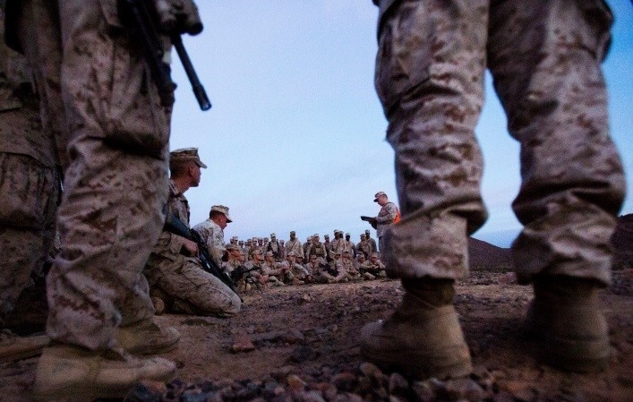 Marines with Alpha Company, 1/8 fire away during company attack