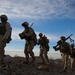 Marines with Alpha Company, 1/8 fire away during company attack