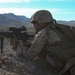Marines with Alpha Company, 1/8 fire away during company attack