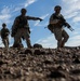 Marines with Alpha Company, 1/8 fire away during company attack