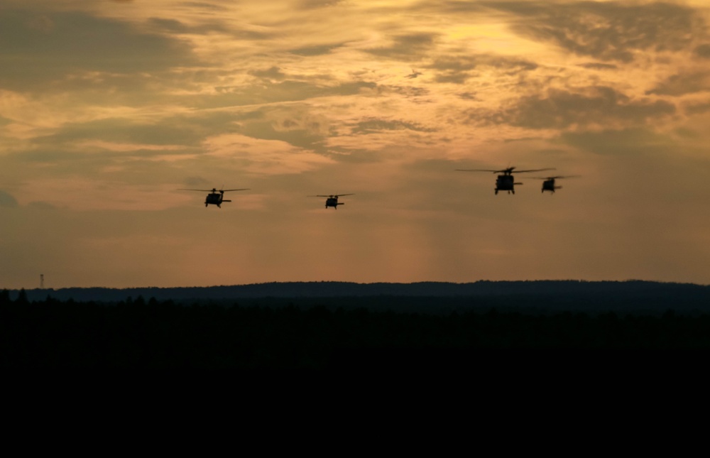 Canadian Chinooks and American Black Hawks fly together