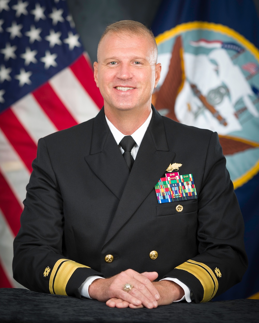 Official portrait of Commander, Naval Facilities Engineering Command and Chief of Civil Engineers Rear Adm. Bret J. Muilenburg, US Navy