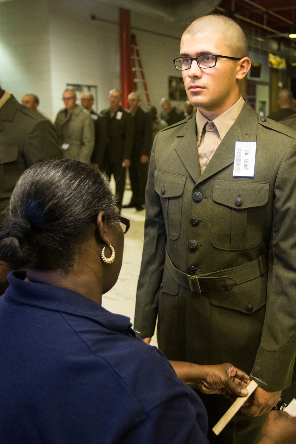 Marine recruits fitted for the Corps’ uniforms on Parris Island