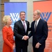 Secretary of defense takes photos with guests before receiving the Woodrow Wilson Award for Public Service