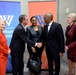 Secretary of defense takes photos with guests before receiving the Woodrow Wilson Award for Public Service