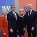 Secretary of defense takes photos with guests before receiving the Woodrow Wilson Award for Public Service