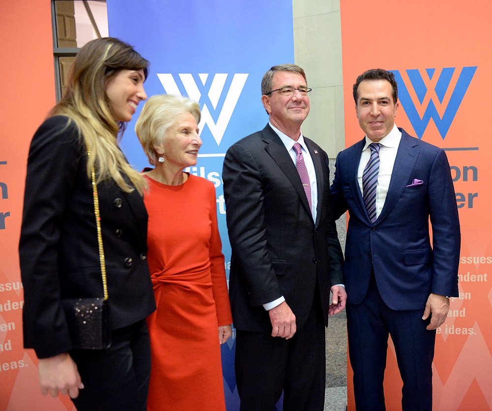 Secretary defense takes photos with guests before receiving the Woodrow Wilson Award for Public Service