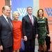 Secretary of defense takes photos with guests before receiving the Woodrow Wilson Award for Public Service