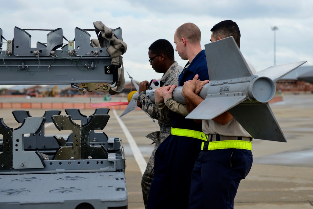 JBLE Airmen maintain the F-22