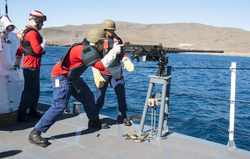 Coast Guard Cutter Halibut crew members conduct machine gun training