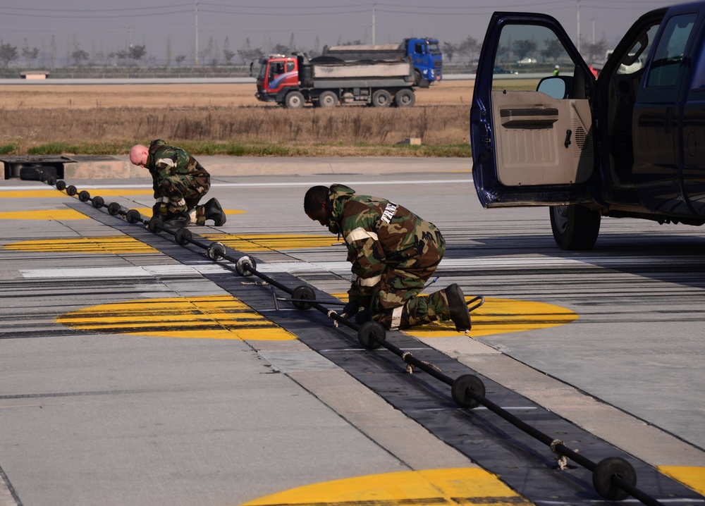 Airfield managers maintain the flightline during Vigilant Ace 16