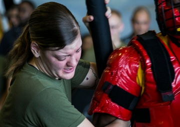 Feeling the burn: U.S. Marines, Sailors learn non-lethal weapons techniques