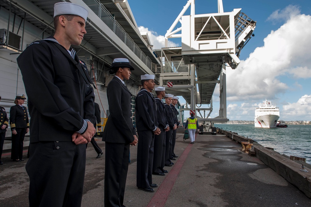 Sailors prepare to render honors