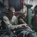 US Marines maintain vehicles at sea