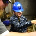 Aircraft elevator maintenance aboard Pre Commissioning Unit Gerald R. Ford (CVN 78)