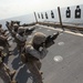 US Marines practice marksmanship at sea