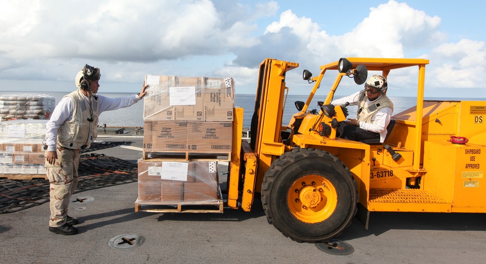 US Marines, Sailors replenish supplies at sea
