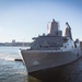 USS New York (LPD 21) arrives on Manhattan's west side as the ship pulls in for port visit